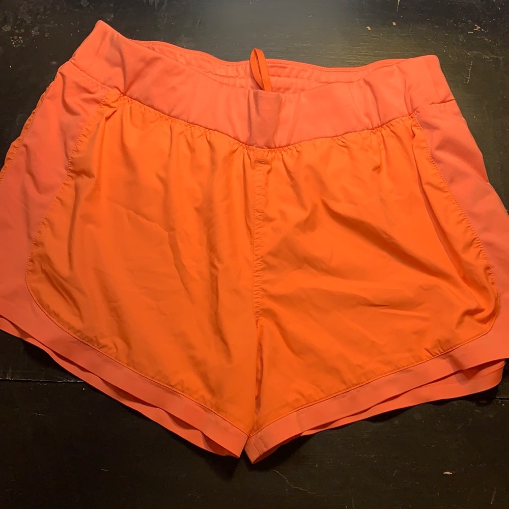 Athleta running draw string shorts w/zip pocket